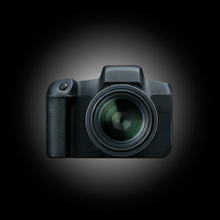 Modern camera isolated on black isolated background. Photographer's equipmentの素材