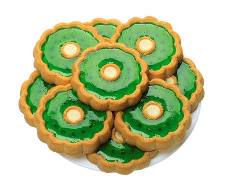 Brown Cookies with green jelly on a white plate, isolatedvの写真素材