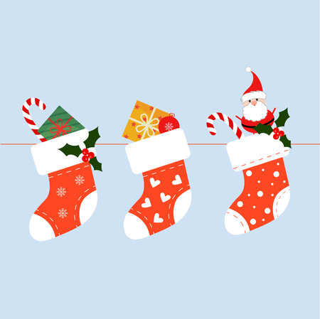 Christmas socks with gifts. New year and xmas celebration. Vector illustrationのイラスト素材