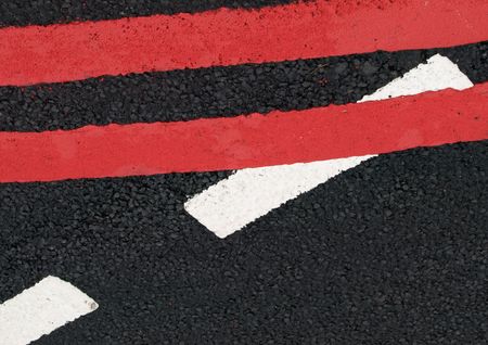 Red road lines on new roadの写真素材