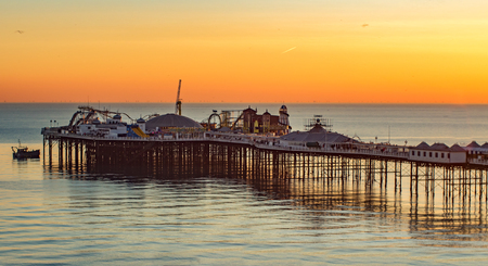 view of Brighton pier at sunset, south of Englandの写真素材