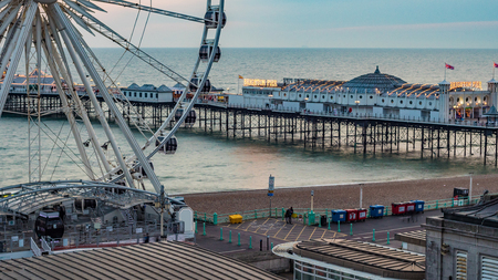 The Victorian Brighton Pier, also known as the Palace Pier and the Brighton wheel at sunsetのeditorial素材