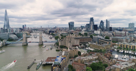 Aerial view of the skyline of the City of London with Tower bridge and the river Thames