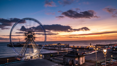 The Victorian Brighton Pier and the Brighton wheel at nightのeditorial素材