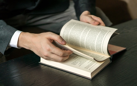 Student is reading book.