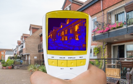 Infrared thermovision image showing thermal insulation of house.