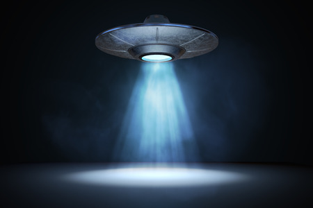 Light beam from flying UFO (alien spaceship). 3D rendered illustration.の写真素材
