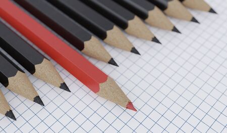 Red pencil and many black pencils on paper. 3D rendered illustration.の写真素材