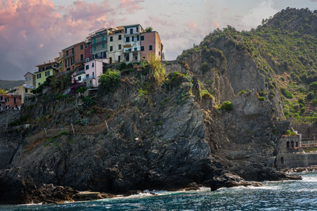 Manarola - italian town. Buildings on cliff. Italy, Cinque Terre, Liguria.