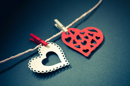 colorful hearts on clothes pin laying on the tableの写真素材