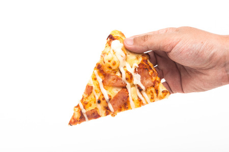 woman hand pickup a pizza isolated backgroundの写真素材