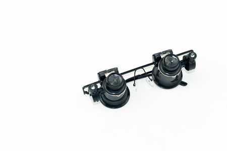 microscope eyes glasses tools isolated on white backgroundの写真素材