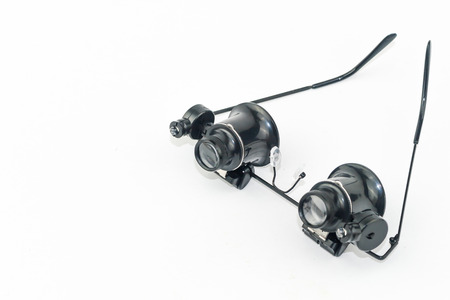 microscope eyes glasses tools isolated on white backgroundの写真素材