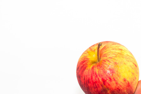 Red apples in glass bowl isolate on white backgroundの写真素材