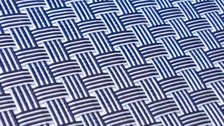 blue knitting vertical and horizontal mat for food plate backgroundの写真素材