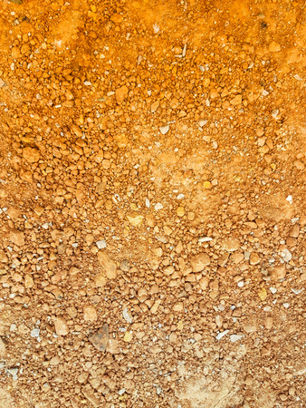 two tone small and large pebble on the brown brick backgroundの写真素材