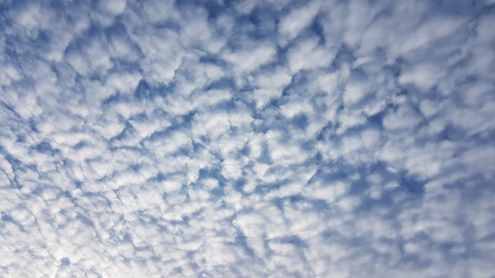 The wave of white clouds in blue sky background