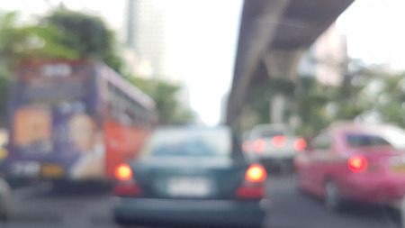 Blurry of trafic jam situation in the capital city backgroundの写真素材