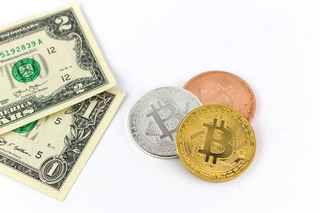 US dollar banknotes with bitcoins isolated on white background