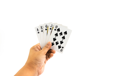 Poker spade Straigt flush in the hand of man isolated on white background
