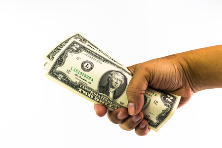US dollar bank in the hand of man isolated on white backgroundの写真素材
