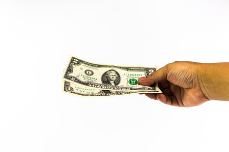 US dollar bank in the hand of man isolated on white backgroundの写真素材