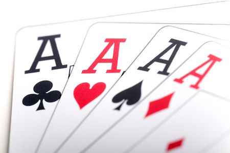 Macro of playing cards showing 4 aces