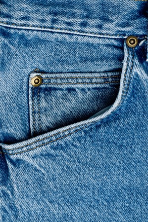 A closeup of an old blue jeans pocketの写真素材