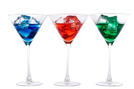 Blue, red and green martini drinks side by sideの写真素材