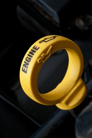 shallow focus close-up of a yellow engine oil dipstickの写真素材