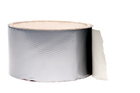 A roll of silver duct tape on whiteの写真素材