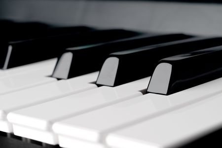 A shallow focus horizontal close up of piano keyboard  keysの写真素材