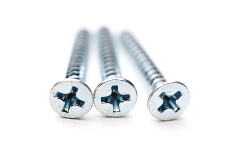 Shallow focus macro of 3 wood screws