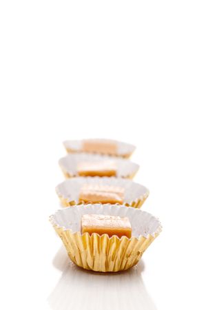 Vertical shallow focus close up of caramel treatsの写真素材