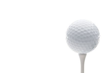 Horizontal close up of a golf ball on a teeの写真素材