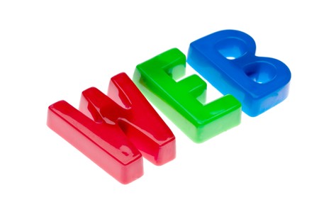 Plastic toy magnetic letters spelling WEB - online educationの写真素材