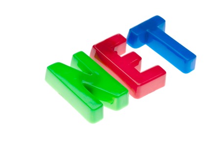 Plastic toy magnetic letters spelling NET - online educationの写真素材