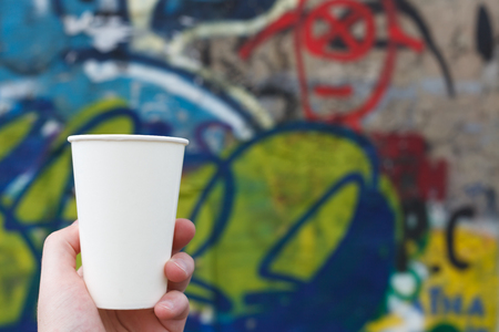 White paper cup on a colored backgroundの写真素材