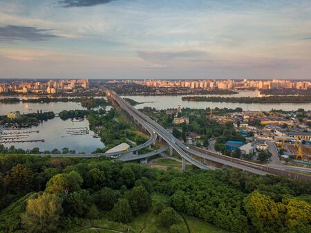 Panoramic view of Kyiv from the sky. Sunset over summer Kiev. Filmed on drone. Aerial viewの写真素材