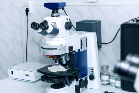 search for a vaccine against the virus. studying under a microscope. scientific discovery