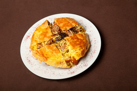 Pie with rice and prunes in Georgianの写真素材
