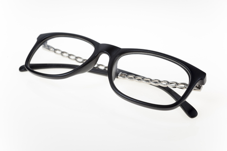 Close-up view on eyeglasses on white backgroundの写真素材