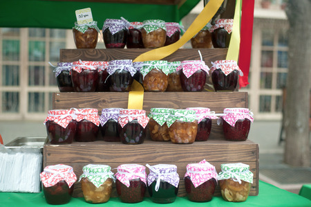 Ukrainian counter which sells a large assortment of jams jarsの写真素材