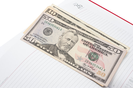 Notepad and money. Background image for finance and bankingの写真素材