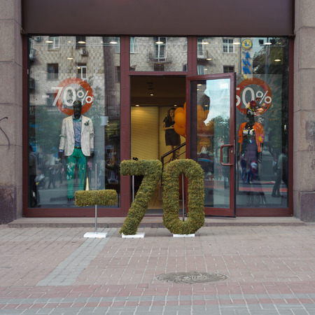 Clothing store. 70% discont symbols made from grassの写真素材