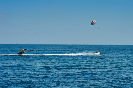 Odessa, Ukraine - August 31, 2015: Parachute on the high seas pulls watercraft on the sea. Parachute on the high. Parachuteのeditorial素材