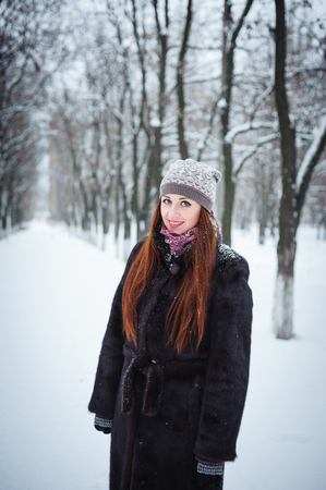 Portrait of a young beautiful girl at winter.の写真素材
