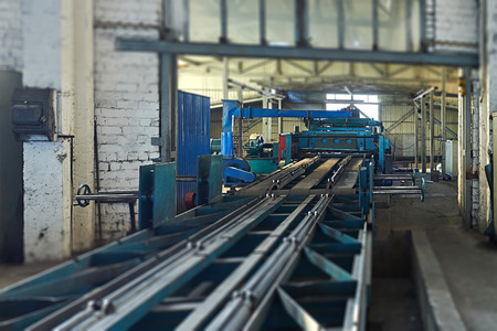 machine for slitting steel sheet. Tilt-shift effect.の写真素材