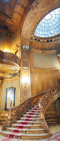 LVIV, UKRAINE - JANUARY 15, 2016: House of Scientists in Lviv, Ukraine. Vertical panoramic view. Vintage wooden spiral staircase.のeditorial素材