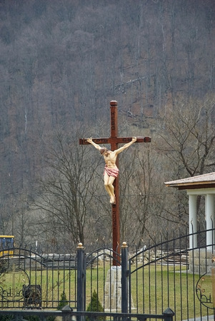 Christian cross with a crucifix in the churchの写真素材